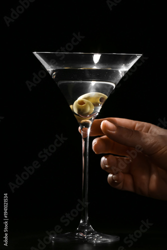 Female hand with glass of m...