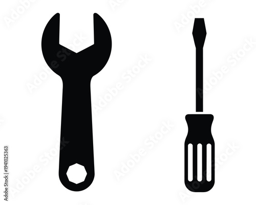 Silhouette of a wrench and screwdriver on a white background