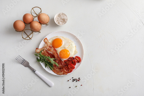 Plate with tasty fried eggs...