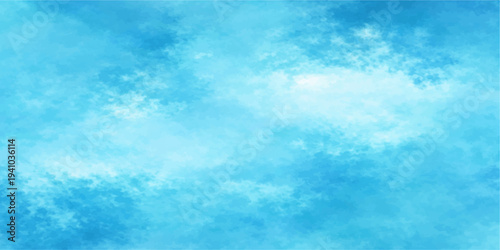 A beautiful summer day features a clear blue sky and fluffy white clouds in a bright natural cloudscape filled with sunlight and fresh air