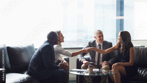 Фотография Business, people and handshake agreement in meeting for merger, partnership or acquisition