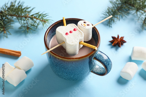 Cup with snowmen made of ta...
