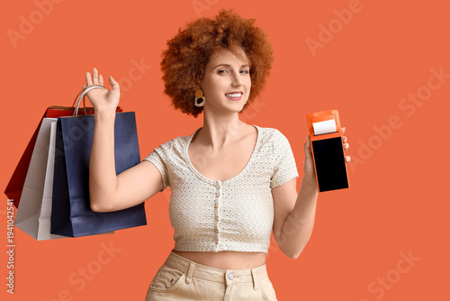 Redhead young woman with pa...