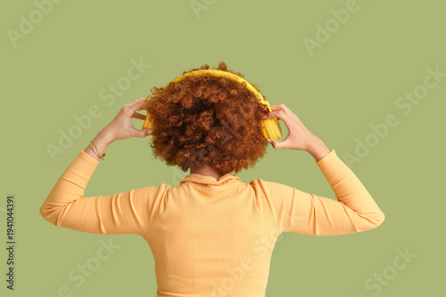 Redhead young woman with cu...