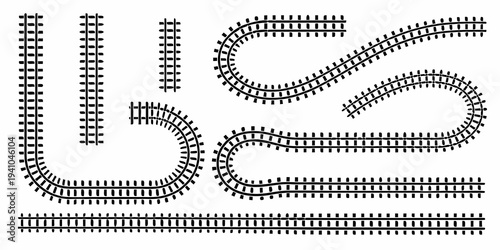 Black and white illustration of various curved and straight railway tracks