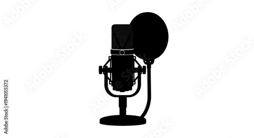 Professional studio microphone on a stand with a pop filter attached, ready for high-quality audio recording in a soundproof environment from a front viewpoint.