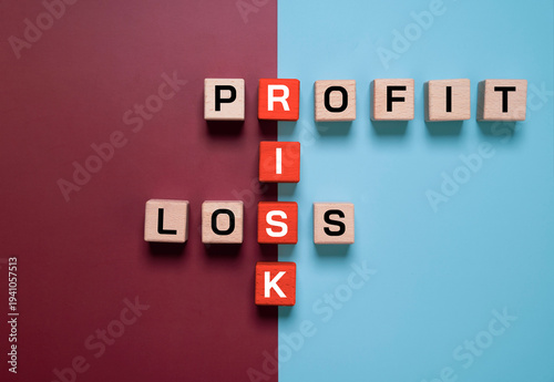 Business risk management concept showing wooden blocks forming the words profit, loss and risk for creative financial strategy idea representing investment decision, uncertainty and business analysis.