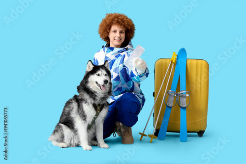 Female tourist with Husky d...