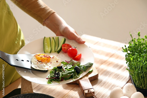 Woman putting over fried ch...