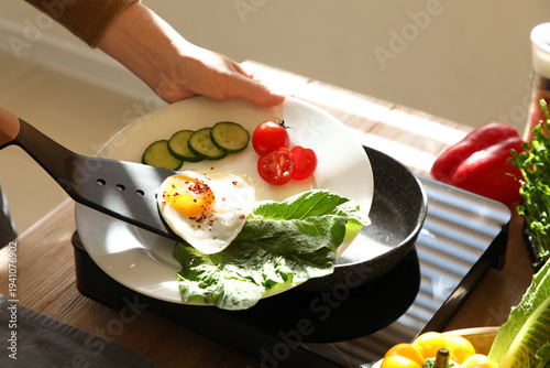 Woman putting over fried ch...