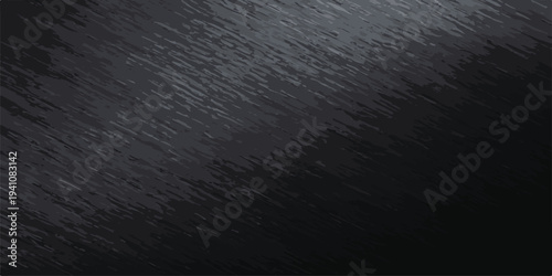 Close-up of brushed dark metal with fine diagonal lines and a subtle light flare, creating a sleek industrial texture