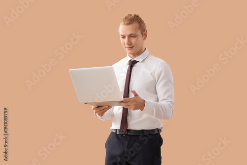 Young businessman working w...