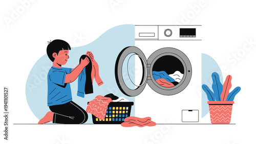 Young boy performs household chores by putting colorful laundry into a front loading washing machine in a modern home.