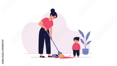 Diligent mother using a broom and dustpan to clean up a red liquid spill on the floor while her young child watches.