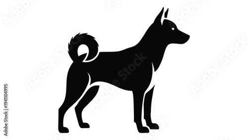 A black silhouette of a dog standing on four legs