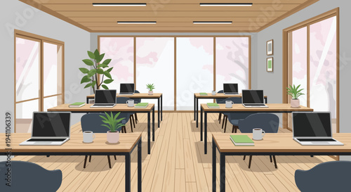 Modern Office Interior with Laptops, Plants, and Natural Light
