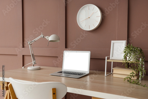 Workplace with blank laptop...