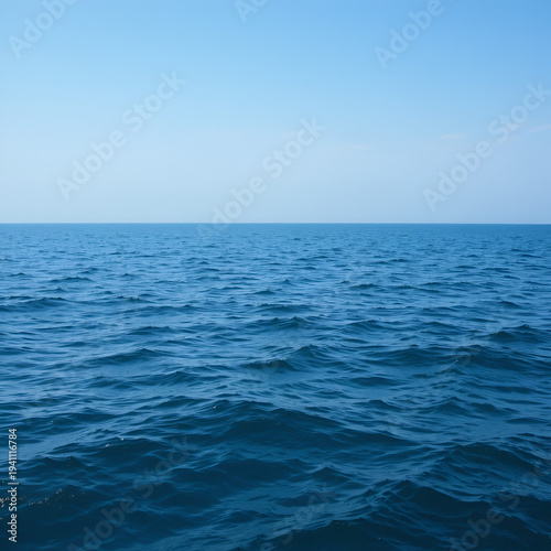 Tranquil Blue Ocean Water with Gentle Rippling Waves and Calm Sea Horizon
