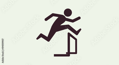 Man running jumping over hurdle obstacle