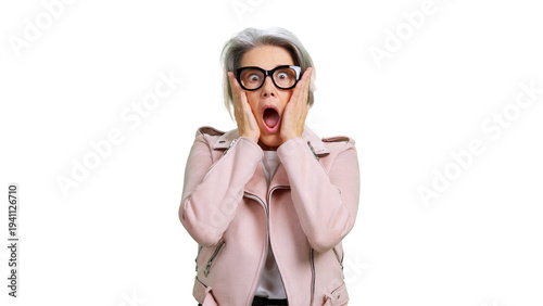 Fotografi Senior woman reacting with surprise and shock