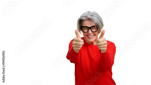 Happy senior woman giving thumbs up for success