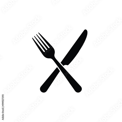 Black fork and knife crossed on white background minimalist dining utensils flat lay