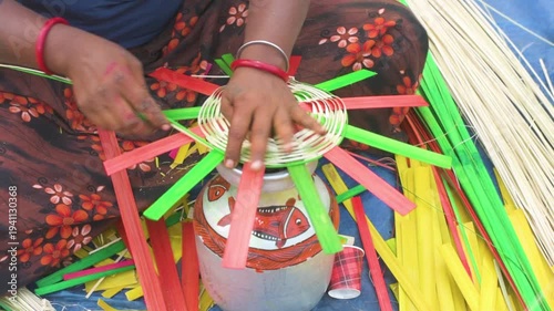 Tribal Woman Weaving Bamboo Basket at Handicraft Fair in West Bengal