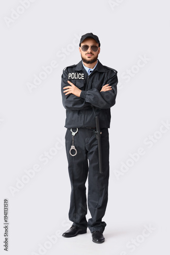 Handsome police officer in ...