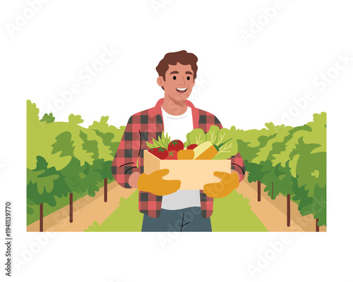 Smiling farmer holding a box of fresh organic vegetables in a lush green farm field
