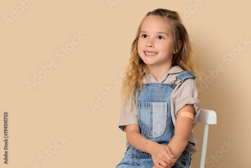 Little girl with applied pa...
