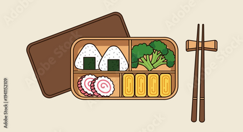 Japanese Bento Box Lunch with Onigiri, Tamagoyaki, Broccoli, and Narutomaki