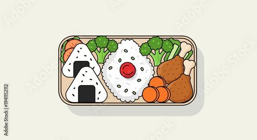 Japanese Bento Box Lunch with Onigiri, Fried Chicken, and Vegetables