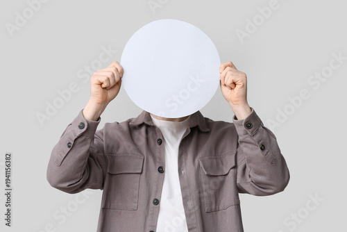 Young man with bitcoin on l...