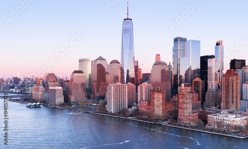 Manhattan aerial panoramic skyline at dusk. Manhattan landscape at dusk. NYC panoramic dusk cityscape of Manhattan. New York panoramic skyline at dusk. Manhattan waterfront.