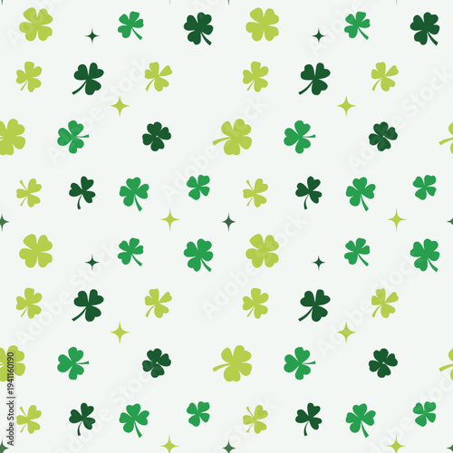 Scattered four-leaf clovers and small star shapes form a repeating seamless pattern in various shades of green on a white surface.