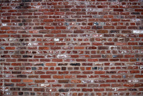 Brick on wall texture. Brick in masonry facade. Brick on rustic surface. Brick redbrick backdrop.