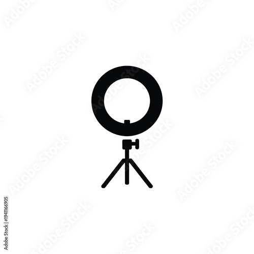 Solid fill of a black ring light mounted on a tripod stand