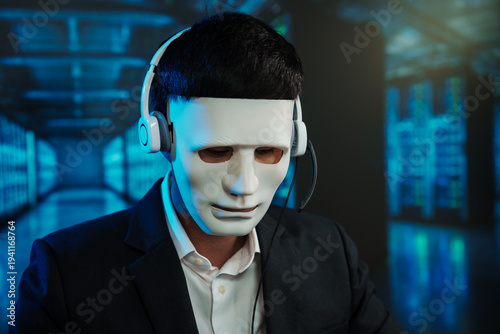 Masked hacker wearing headset in server room