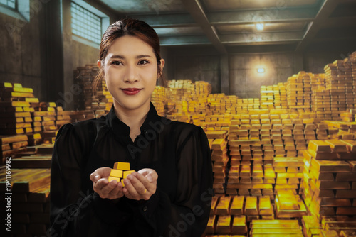 Smiling woman holding small gold bars in hands inside a vault, surrounded by stacked gold bullion under warm lighting, concept of wealth, investment, security.