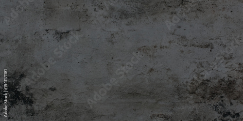 Dark grey concrete wall texture with weathered cement surface includes natural imperfections, cracks, and dark atmospheric stains for urban-style designs, architectural mockups.