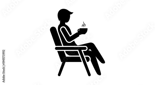 Silhouette of a person enjoying a hot beverage in a comfortable chair for tranquil moments