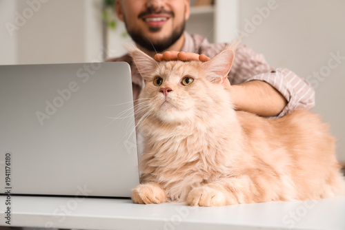 Young man working with mode...