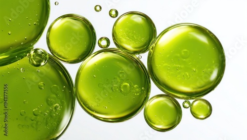 A close-up of vibrant green bubbles, showcasing a mix of sizes and textures, creating an abstract and refreshing visual effect.