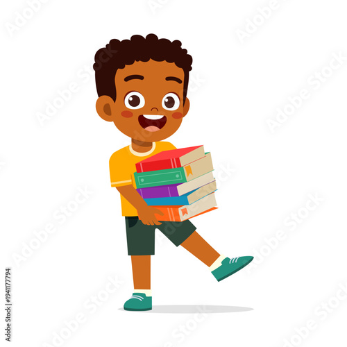 Happy African American boy smiling widely carrying a stack of colorful books with a joyful expression