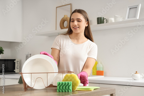 Young woman with holder of ...