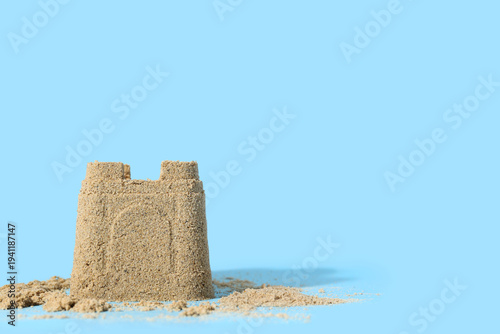 Beautiful sand castle on bl...
