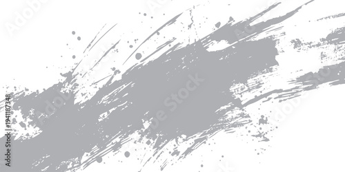 Grey paint splatters and brush strokes on white background