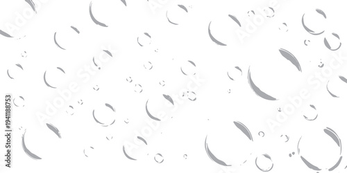 Scattered grey brush stroke circles and arcs on white background