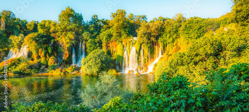 Tableau sur toile Kravice Waterfalls on the Trebižat River, a natural amphitheater of cascading water and lush green nature near Ljubuški, Bosnia and Herzegovina