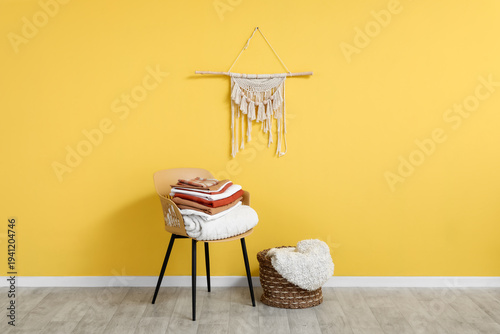 Chair with stack of clean b...